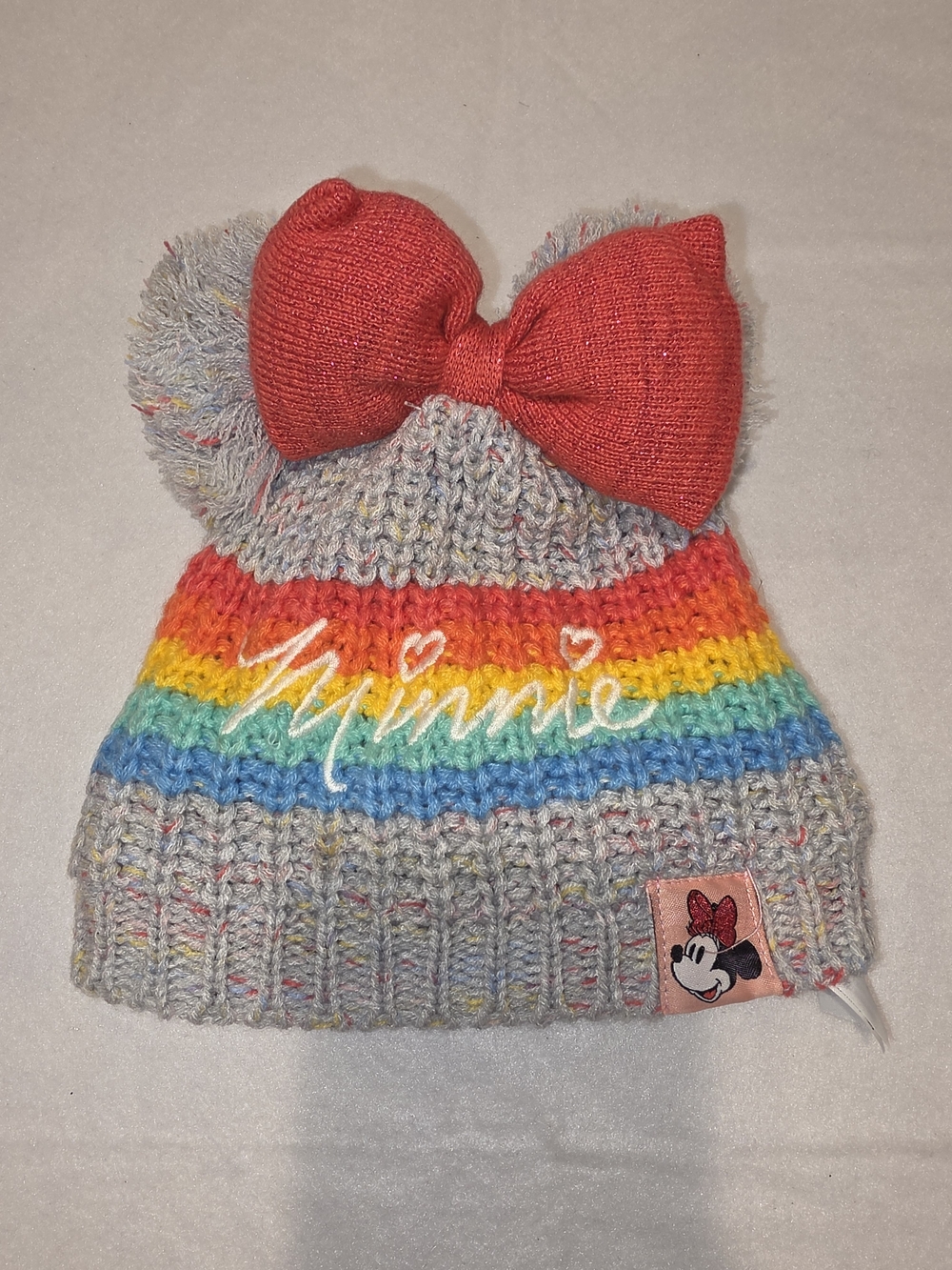 Disney Rainbow Knit Beanie with Red Bow